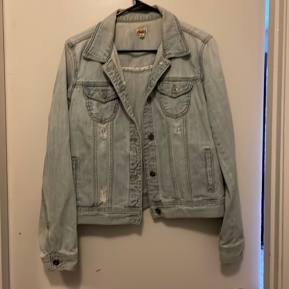 Distressed denim jacket
